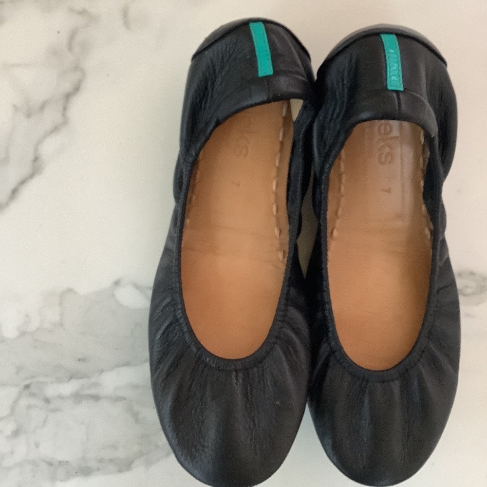 Tieks in versatile black leather. Lightly worn.